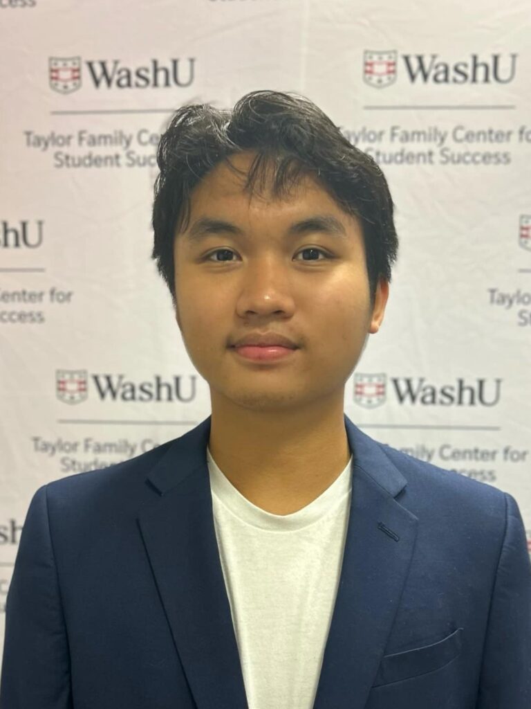 Andrew Aviado, student at WashU in a blazer