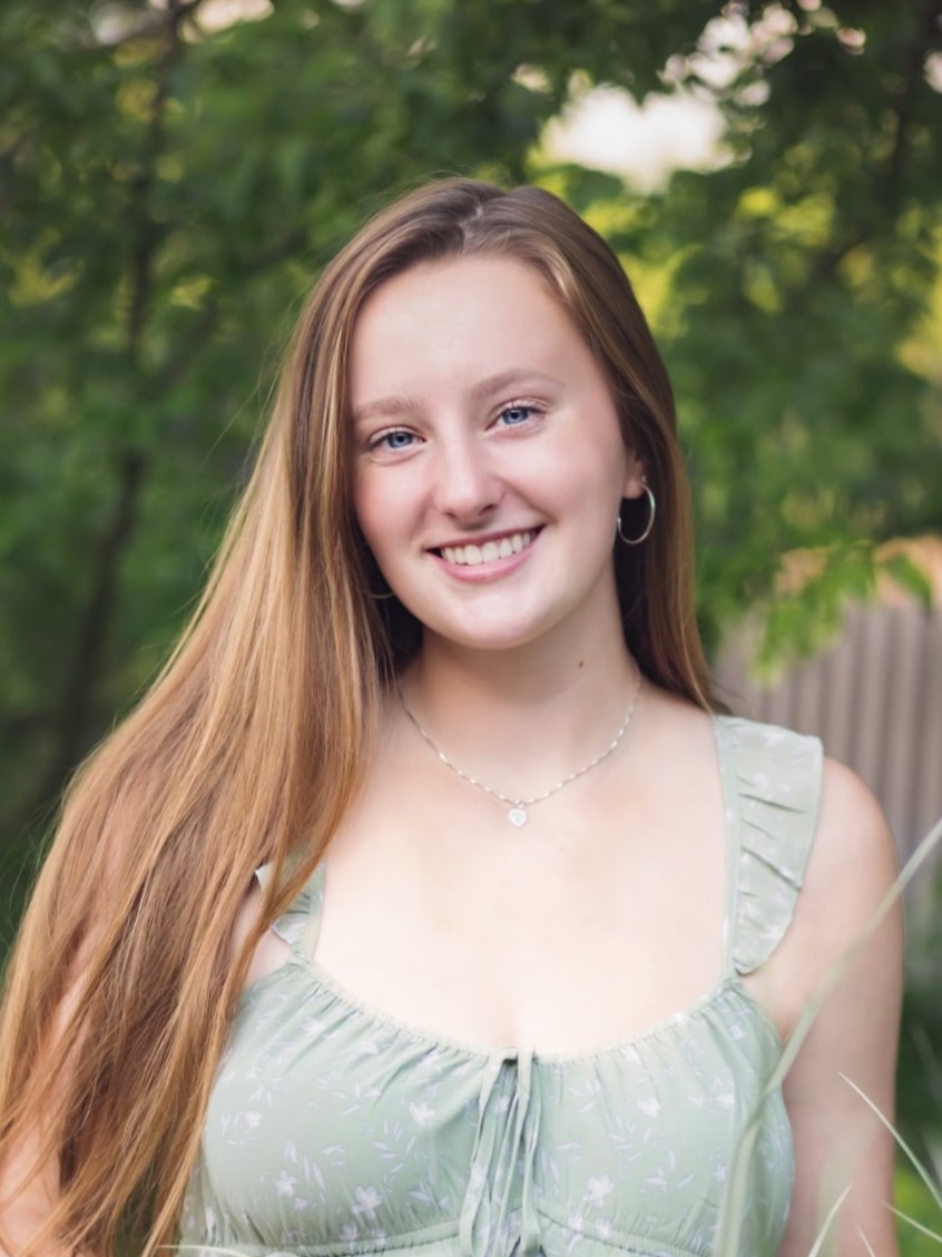 Jordyn Ederer, student at WashU, in a mint flowery top