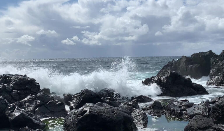 When waves meet the shore, sea spray levels up